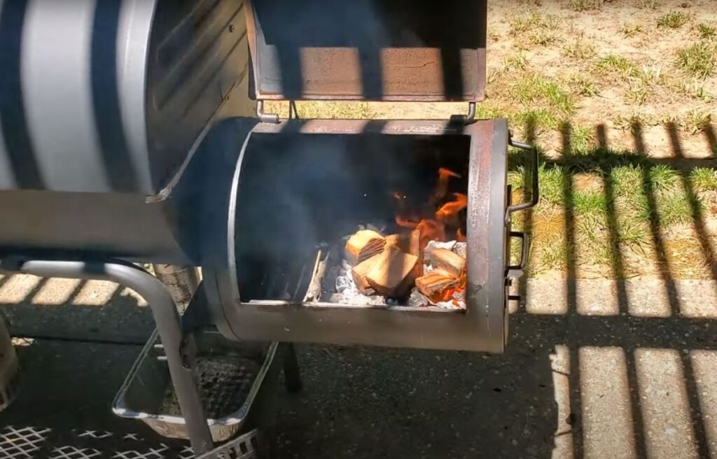Burning charcoal and wood in offset smoker
