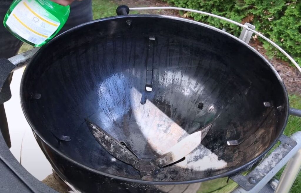 Cleaning a charcoal smoker