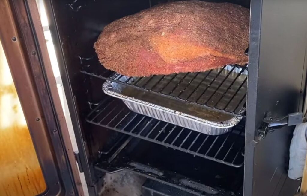 Cooking brisket on a vertical smoker