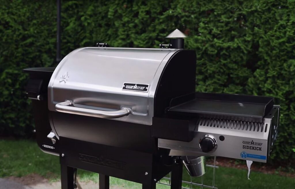 A pellet grill with compatible sidekick