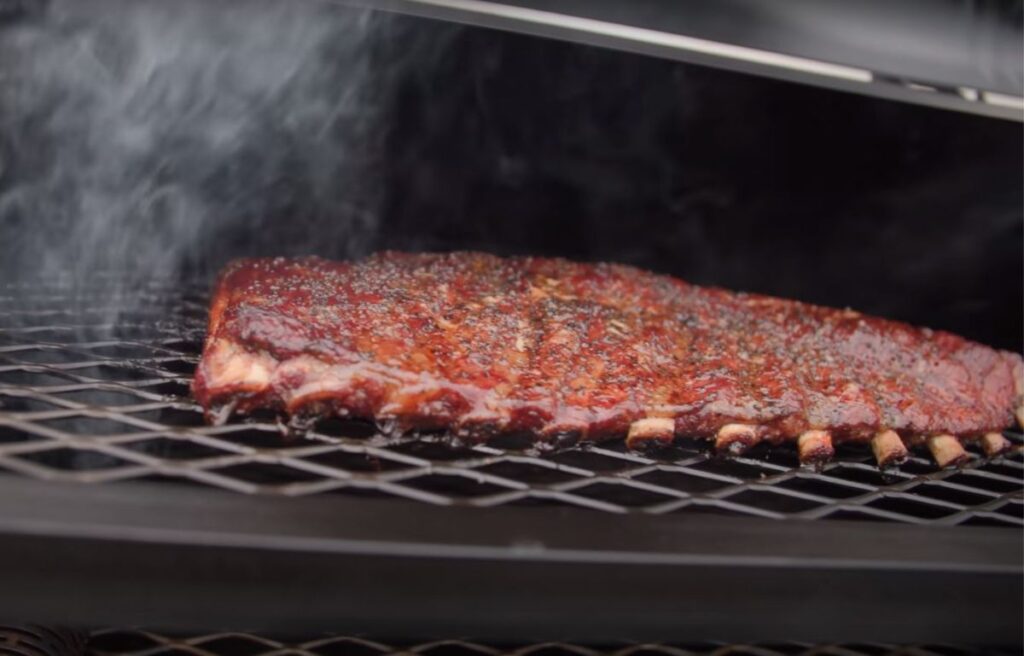 Smoking ribs with smoke tube on a pellet grill