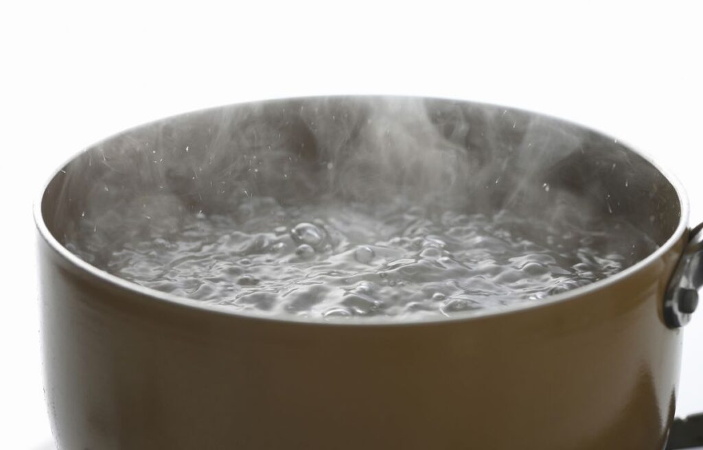 Boiling water on a grill