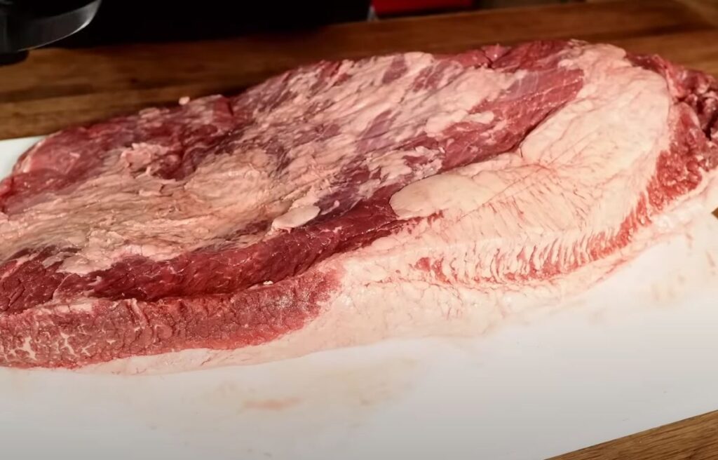 Trimming the beef brisket
